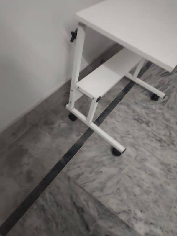 you can use this table as a laptop table or  for eating. 2