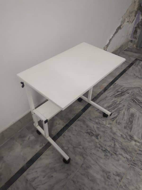 you can use this table as a laptop table or  for eating. 3