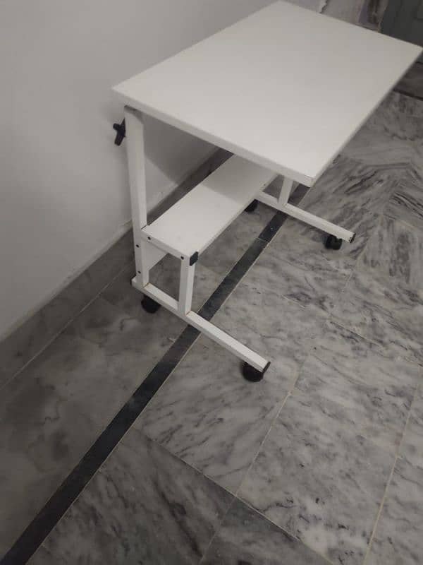 you can use this table as a laptop table or  for eating. 4