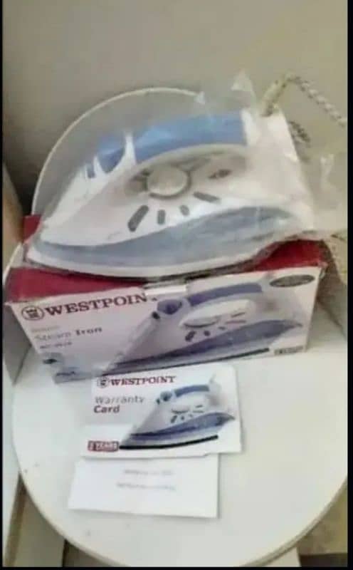 west point steam iron. 2 se 3 month use. excellent condition 1