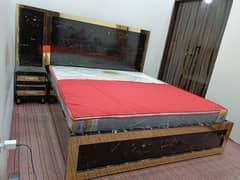 king bed with 1 side table with matters