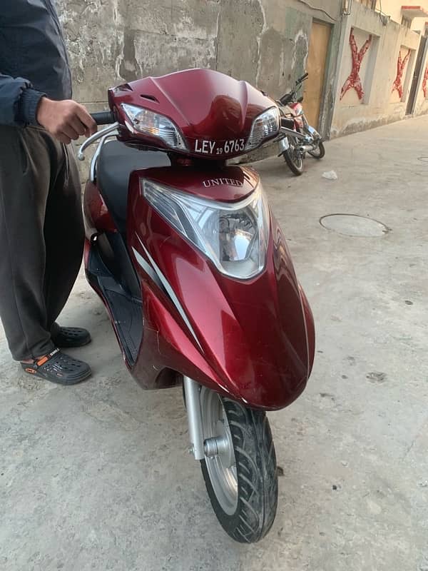 united scooty 100cc 1