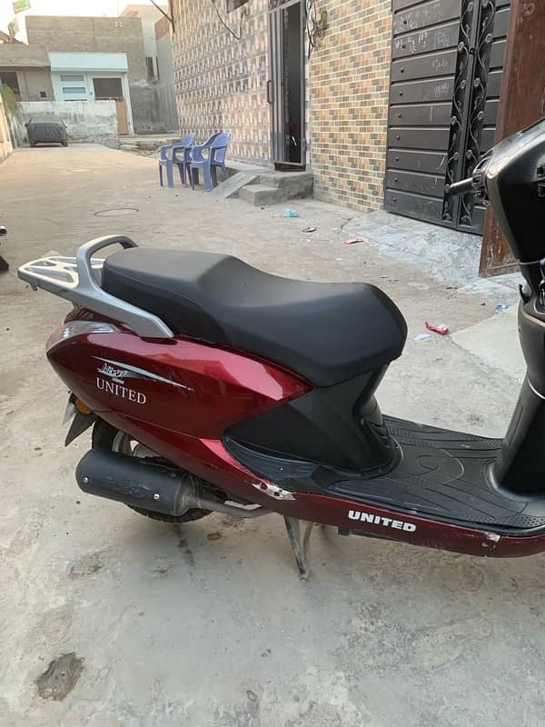 united scooty 100cc 5