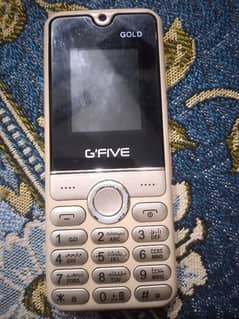 g five phone gold with side buttons torch mp 3 with box