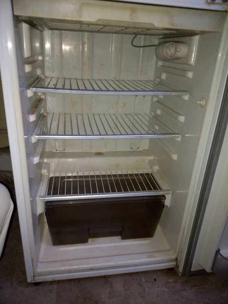 Waves glass door freezer with iron trolley, Dawlance small fridge 11