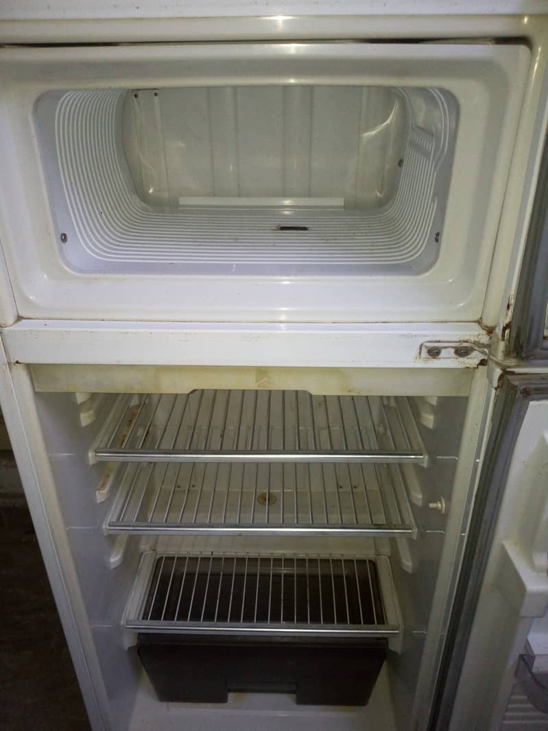 Waves glass door freezer with iron trolley, Dawlance small fridge 12