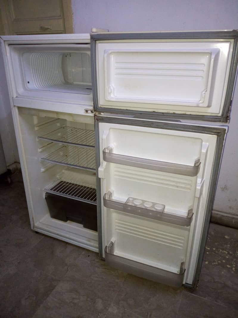 Waves glass door freezer with iron trolley, Dawlance small fridge 13