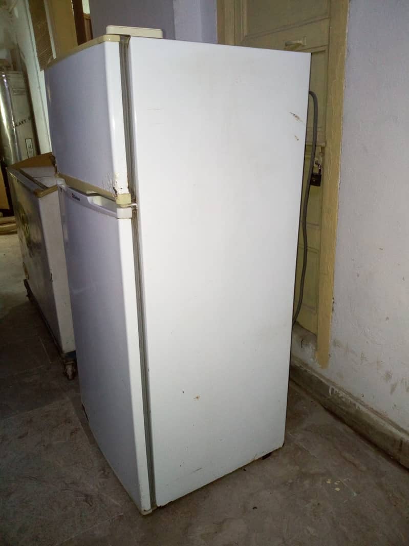 Waves glass door freezer with iron trolley, Dawlance small fridge 16