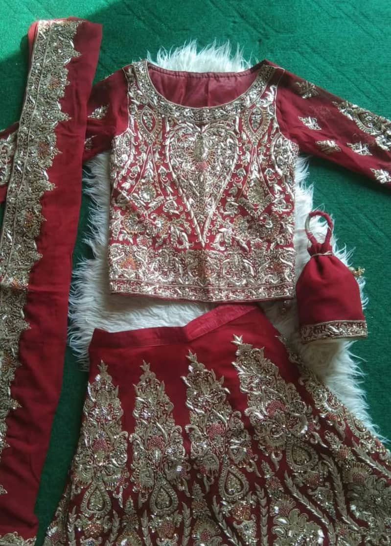 Maroon golden work bridal lehnga set includes Choli, dupatta, lehnga 1