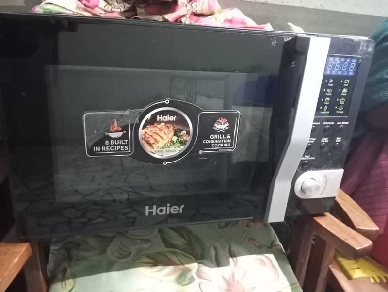 Haiier Microwave oven Model HMN 32100BEGB-01 0