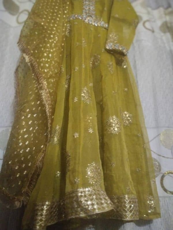 a very beautiful olive green mehndi dress 8