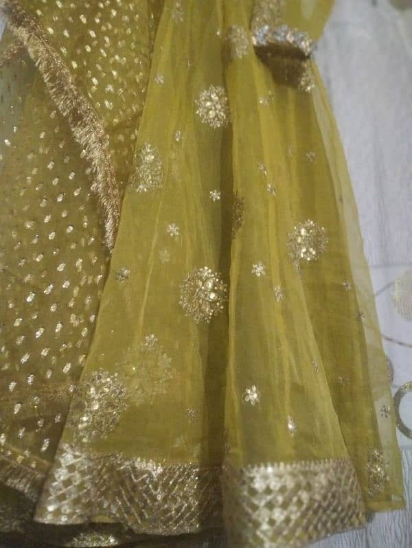 a very beautiful olive green mehndi dress 9