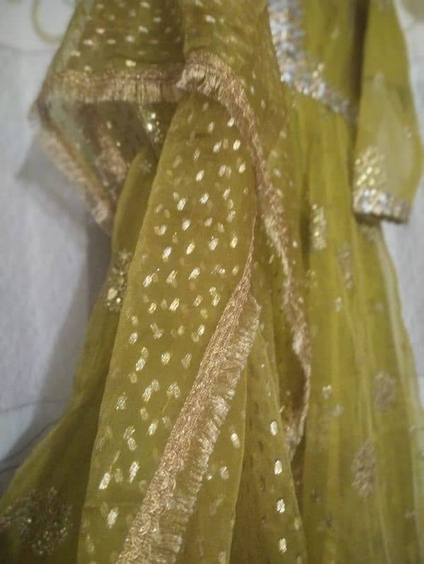 a very beautiful olive green mehndi dress 10