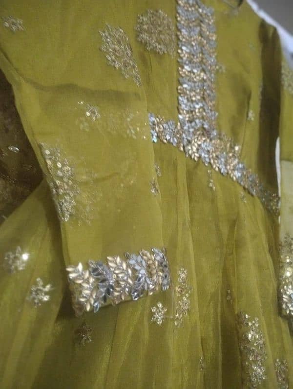 a very beautiful olive green mehndi dress 11