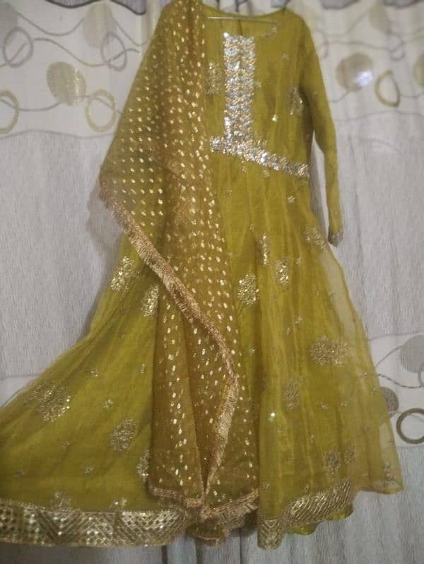 a very beautiful olive green mehndi dress 14