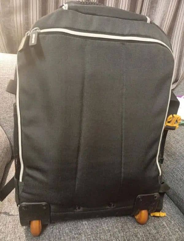 IKEA travelling bag with stripes and wheel system both 5