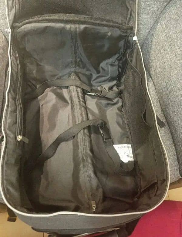 IKEA travelling bag with stripes and wheel system both 9