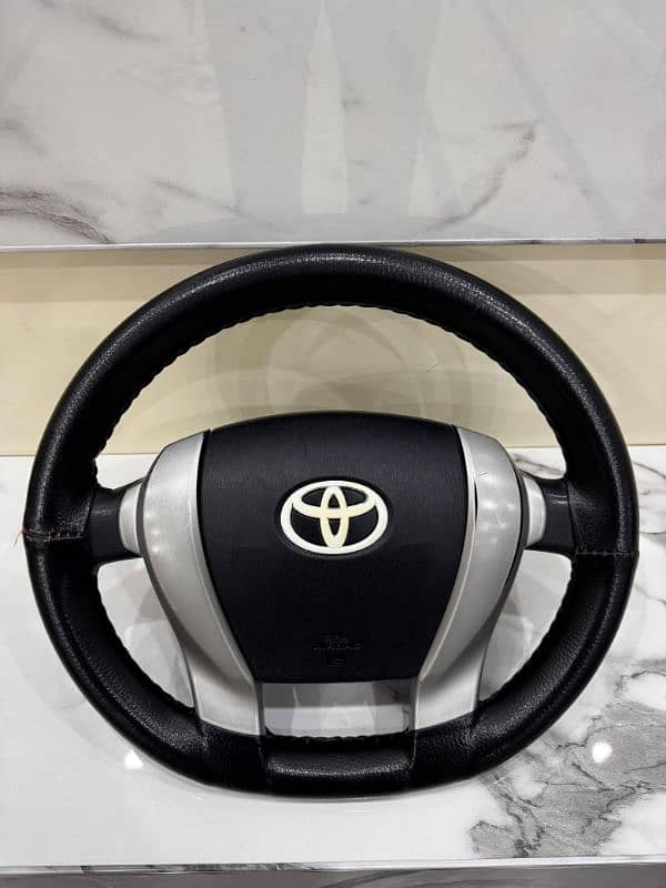 Toyota Aqua Steering wheel with air bag 1