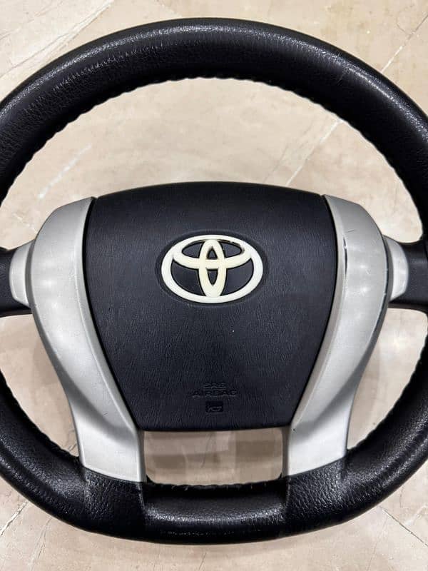 Toyota Aqua Steering wheel with air bag 2