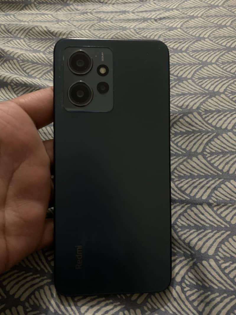 redmi note 12  condition 9.5 with box charger 0