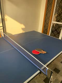 Table tennis - 2 months used with pair of rackets