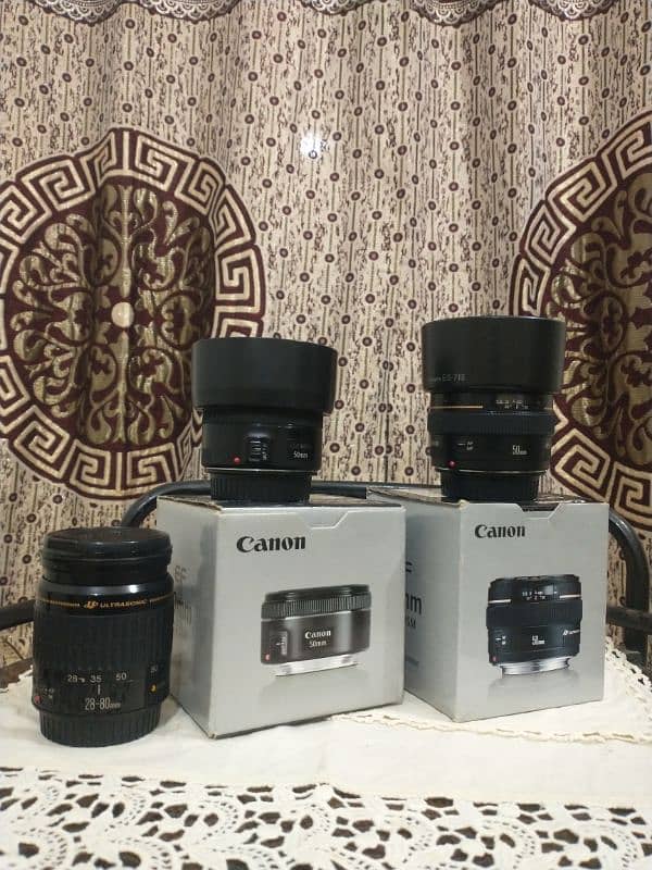 Canon 50mm 1.4 Lens and 50mm 1.8 lens and 28-80 3.5 lens 0