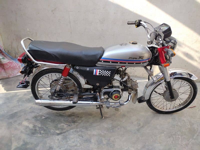 United 70cc 2023 0