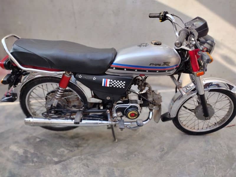 United 70cc 2023 1