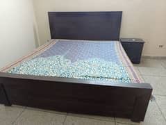 Wooden double bed with Mattress