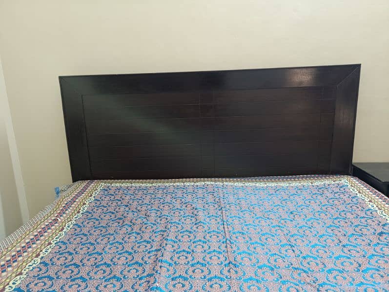 Wooden double bed with Mattress 1