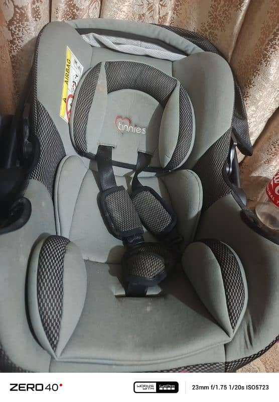 tinnies carry cot cum car seat 0