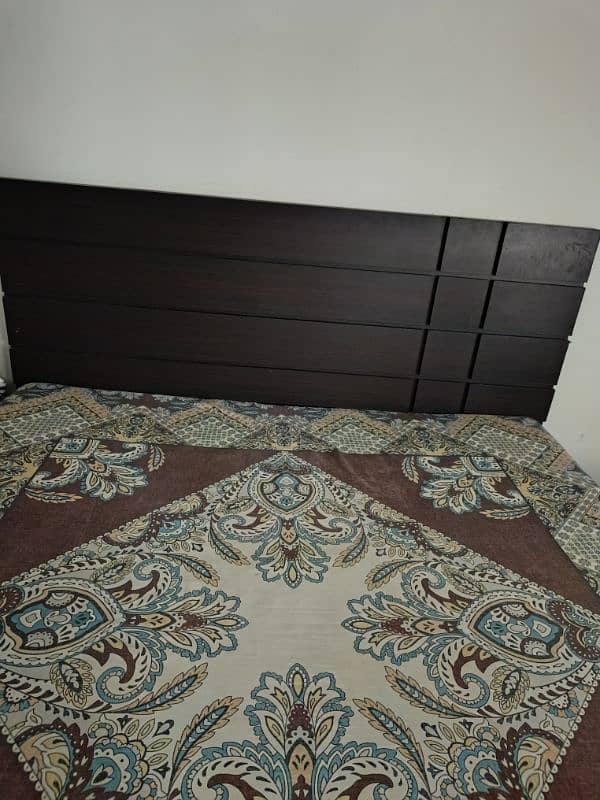 double bed with side tables. 2