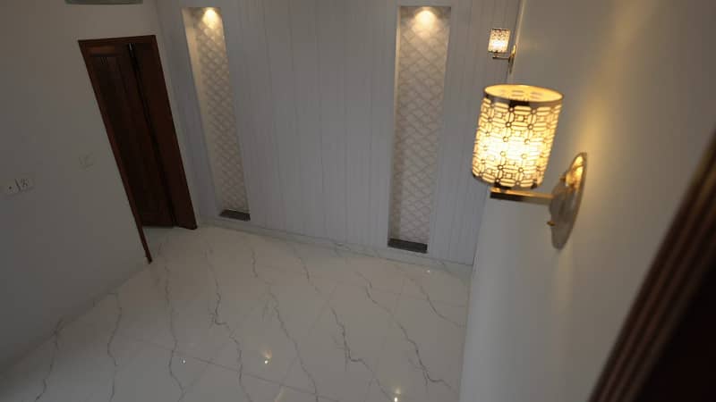 5 MARLA BRAND NEW HOUSE FOR SALE ON MAIN 80 FEET ROAD LOW COST G BAHRIA ORHCARD LAHORE 11