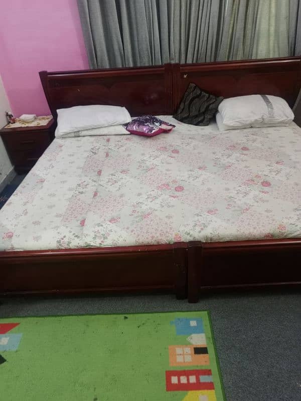 2 single beds with 2 side tables 3