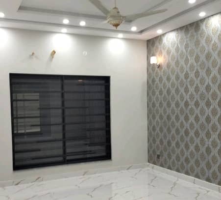 10 Marla Modern House In Bahria Town Overseas B Extension Lahore 1