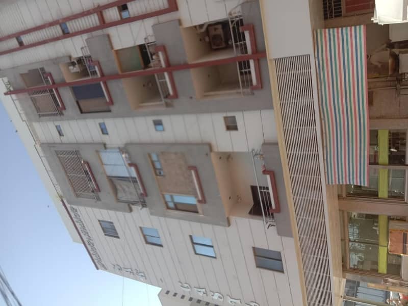 NEWLY FLAT 2 BAD DD 3RD FLOOR ROAD FACING ON MAIN RASHID MINHAS ROAD 3