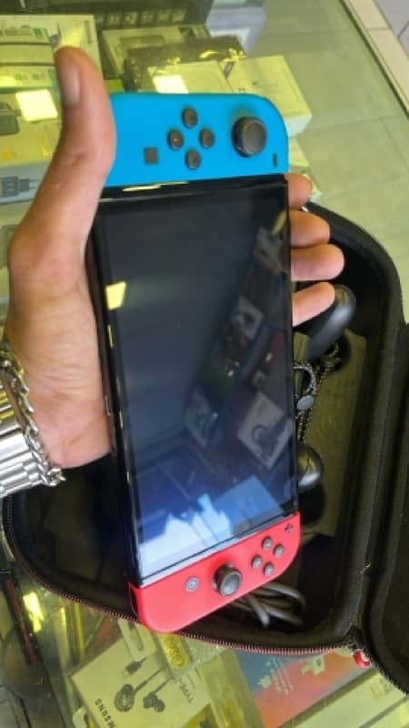 Nintendo Switch oled slightly used in mint condition 0