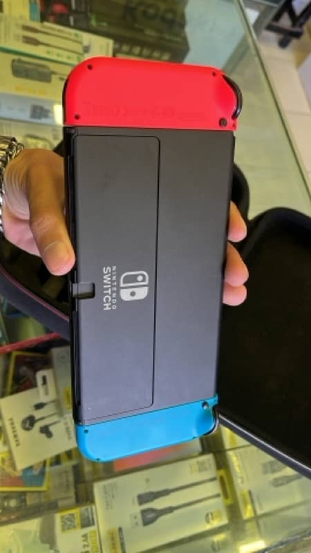 Nintendo Switch oled slightly used in mint condition 1