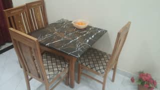 4 seater dining table with marble top