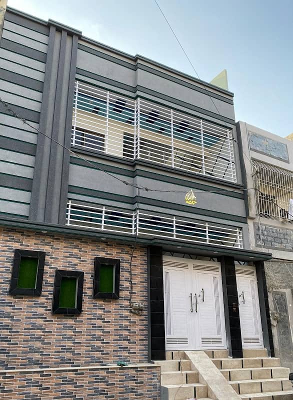 Brand new zero meter House ground plus 1 ideal location Excellent work and materials North karachi vip sector 5A-3 next to main road first street 3