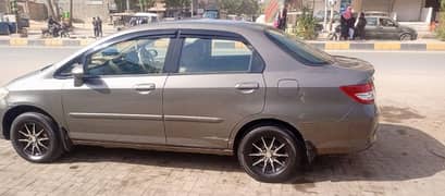 Honda City IDSI 2004 on my name daily driven, btr toyota suzuki liana