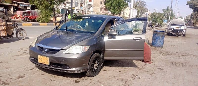 Honda City IDSI 2004 on my name daily driven, btr toyota suzuki liana 1