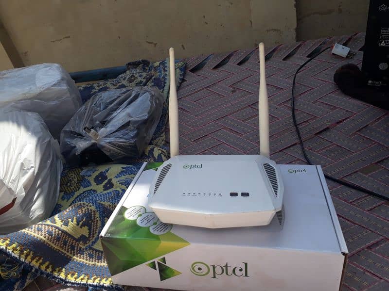 ptcl modem. computer speakers & dish receiver for sale 0