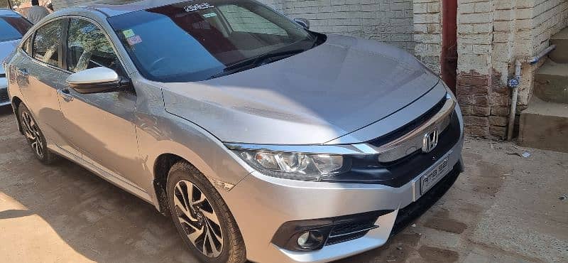 Honda Civic 19  ug full option 12