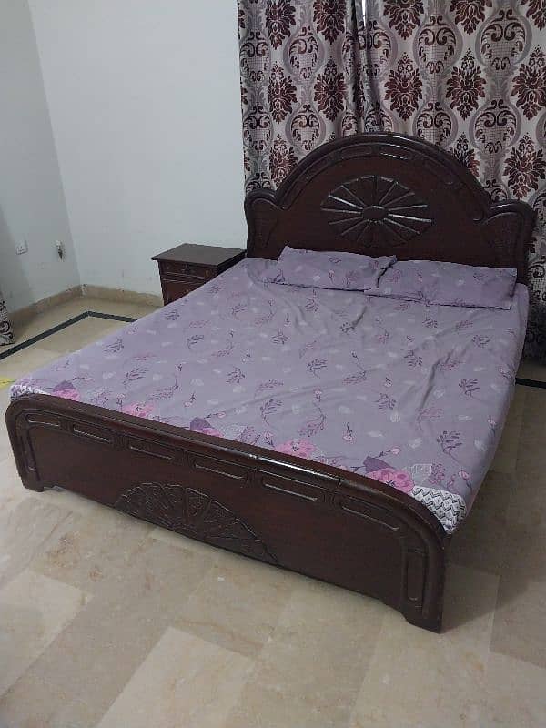 Double bed with side table 0