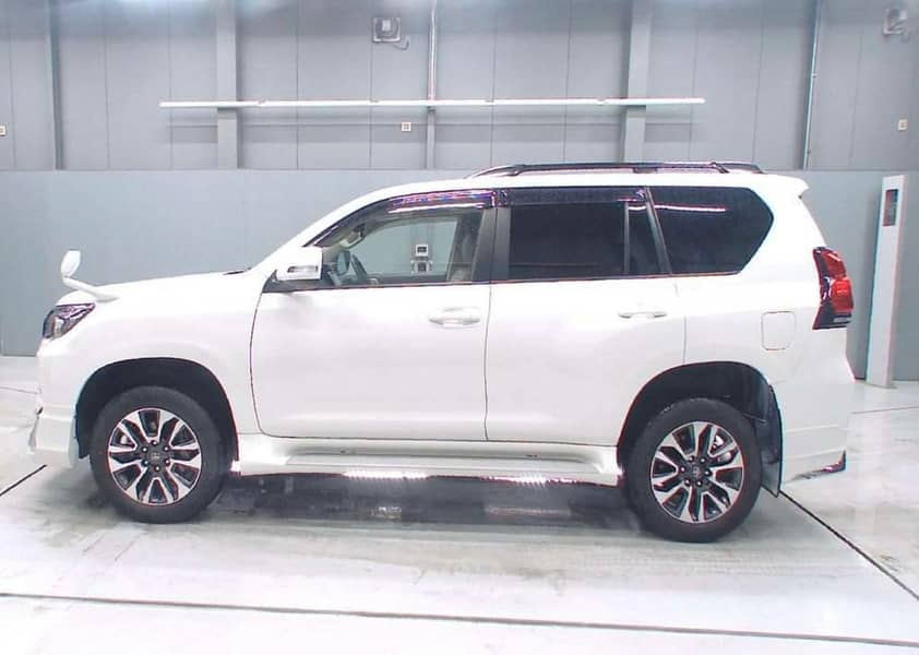 Toyota Prado TXL 2020/2025, Pearl white with beige 1