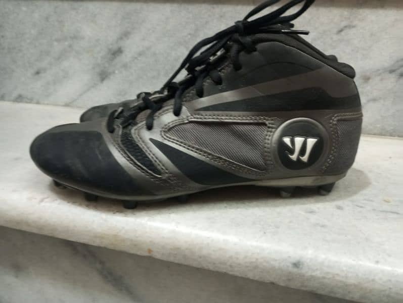 warrior football sneakers in good condition 1