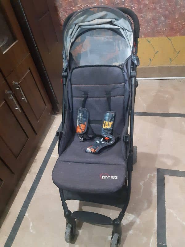 Tinnis slightly used branded Pram 0