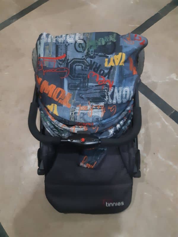 Tinnis slightly used branded Pram 3