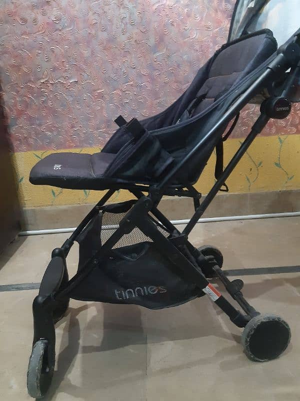 Tinnis slightly used branded Pram 4